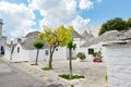 Trulli of Alberobello, Puglia, Italy: Typical houses built with dry stone walls and conical roofs. In a beautiful sunny day. Royalty Free Stock Photo