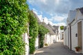 Trulli of Alberobello, Puglia, Italy: Typical houses built with dry stone walls and conical roofs. In a beautiful sunny day. Royalty Free Stock Photo