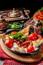 Traditional Turkish, Arabic cuisine. Ali Nazik Kebab. Chopped  lamb with eggplant, yogurt and garlic. Ottoman food. Serving dishes Royalty Free Stock Photo