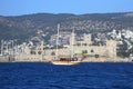 Traditional Turkish Boat or Gulet cruising at sea. Touristic Sail Boats near the beach of Bodrum, Aegean Turkey.