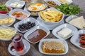 Delicious,Natural,Traditional Turkish Breakfast on the wooden table with copper egg pan.Top and large view. Royalty Free Stock Photo