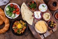 Traditional Turkish breakfast with meze and simit Royalty Free Stock Photo