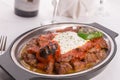 Traditional Turkish Bursa Iskender Kebap Garnished with Grilled