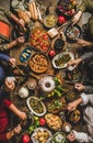 Turkish family feasting at table with traditional foods and raki Royalty Free Stock Photo