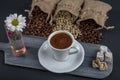 Traditional turkish coffee drink concept. Turkish coffee with glass of water and turkish delights on wooden table Royalty Free Stock Photo