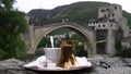 Traditional Turkish coffee in front of Old bridge in Mostar