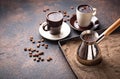 Traditional turkish coffee prepared on hot sand Royalty Free Stock Photo