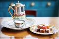 traditional turkish coffee set beside a small plate of turkish delight Royalty Free Stock Photo