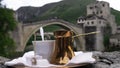 Traditional Turkish coffee and a view of Mostar Old bridge, Bosnia And Herzegovina