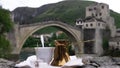 Traditional Turkish coffee and a view of Mostar Old bridge, Bosnia And Herzegovina.