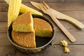 Traditional Turkish Corn Bread on the wooden table with fresh corns.