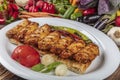 Traditional Turkish Cuisine, Grilled chicken wings baking on wooden background, top view Royalty Free Stock Photo