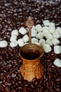 Traditional turkish delight laying on brown wooden board with cooper vintage