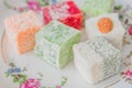 Traditional turkish delight on a plate. Assorted Oriental sweets Royalty Free Stock Photo