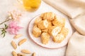 Traditional turkish delight rahat lokum with glass of green tea on a gray concrete background, side view, selective focus Royalty Free Stock Photo