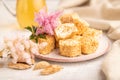 Traditional turkish delight rahat lokum with glass of green tea on a gray concrete background, side view, selective focus Royalty Free Stock Photo