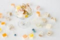 Traditional Turkish Delight with various flavor `Lokum` in glass candy bowl