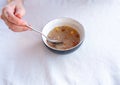 Traditional Turkish dessert ashure or Noah`s Pudding with spoon on the table Royalty Free Stock Photo