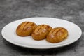 Traditional Turkish dessert sekerpare on a dark background. Close up Royalty Free Stock Photo