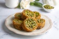 Traditional Turkish desserts Kadaif stuffed with pistachios. Turkish name Kadayif dolmasi or dolma kadayif. Halep sarma, halep