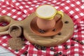 Traditional Turkish Dibek coffee in coffee cup on wooden table. Turkish dibek coffee grinded in a large stone mortar with the