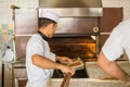 Traditional Turkish dish peed with cheese or meat. A baker of Turkish nationality rolls out the dough and puts it in the oven