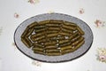 Traditional Turkish Dolma, Sarma or Dolmades on grey plate top view. Royalty Free Stock Photo