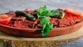 Traditional Turkish Doner Kebab also known iskender. Iskender kebab iskender kebap. Turkish style doner kebab food on wooden tray Royalty Free Stock Photo