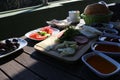 Traditional Turkish family breakfast table and people taking various food. Royalty Free Stock Photo