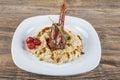 Traditional Turkish Food Lamb`s shank and rice. Slow cooked lamb`s shank with eggplant Royalty Free Stock Photo