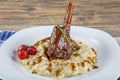 Traditional Turkish Food Lamb`s shank and rice. Slow cooked lamb`s shank with eggplant Royalty Free Stock Photo