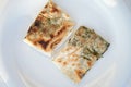 Traditional turkish homemade tortillas - gozleme with spinach on a white plate. View from above.