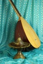 Traditional turkish lamps, national musical instrument baglama saz on a blue background. still life in turkish Royalty Free Stock Photo