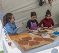 Traditional Turkish pizza, called Lahmacun, being prepared with meat, onion and parsley