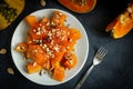 Traditional Turkish Pumpkin Dessert with sherbet on rustic table