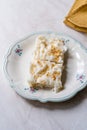 Traditional Turkish Ramadan Dessert Gullac . It is made with gullac rice wafer or rice paper sheets , milk, rose water, walnut, Royalty Free Stock Photo