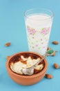 Traditional Turkish sweet supangle dish, a glass of airan and almonds Royalty Free Stock Photo