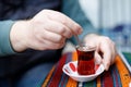 Traditional Turkish tea that is drunk near a cafe on the market street of Istanbul Royalty Free Stock Photo
