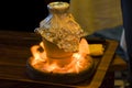 Traditional Turkish Testi Kebab - Tandir - Pottery Kebab cooked in clay pt over fire in Istanbul