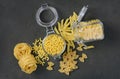 Traditional types and shapes of Italian pasta in glass jars Royalty Free Stock Photo