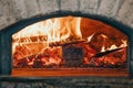 Traditional typical Italian oven for pizza. Oven with bright fire