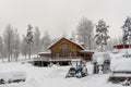 Traditional typical Scandinavian Swedish house or villa in the countryside in winter. Two floors old wooden house after snowfall. Royalty Free Stock Photo