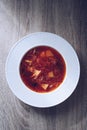 Traditional Ukrainian borscht. Plate of red beet root soup borsch. Traditional Ukraine food cuisine. Royalty Free Stock Photo