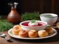 Traditional Ukrainian dish composed of a steaming bowl of beet soup, garnished with fresh dill and a dollop of sour cream on top