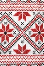 Traditional Ukrainian embroidery on white canvas as background, closeup. National handicraft