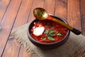 Traditional Ukrainian Russian borscht . Bowl of red beet root soup borsch with white cream Royalty Free Stock Photo