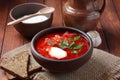 Traditional Ukrainian Russian borscht . Bowl of red beet root soup borsch with white cream Royalty Free Stock Photo