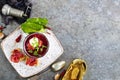 Traditional Ukrainian Russian borscht . Bowl of red beet root soup borsch with white cream . Beet Root delicious soup