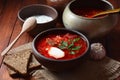 Traditional Ukrainian Russian borscht . Bowl of red beet root soup borsch with white cream Royalty Free Stock Photo