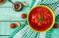 Traditional Ukrainian Russian vegetable borscht soup on green bowl. Royalty Free Stock Photo